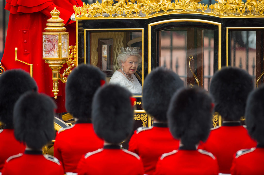 Queen Elizabeth II leaves Buckingham Palace, London, in the Diamond Jubilee State Coach to attend the State Opening of Parliament  Dominic Lipinski/PA Wire