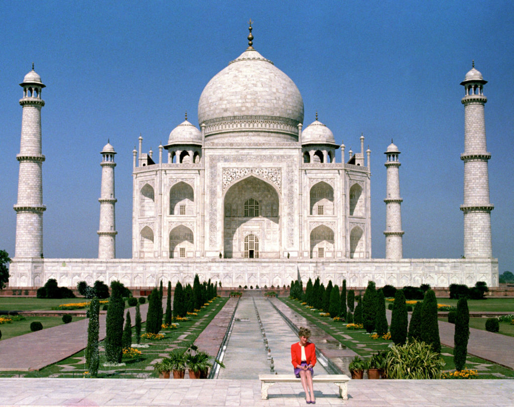 The Princess of Wales sitting alone in front of the monument to love, the Taj Mahal, during a royal tour of India in 1992. Picture by Martin Keene, PA  