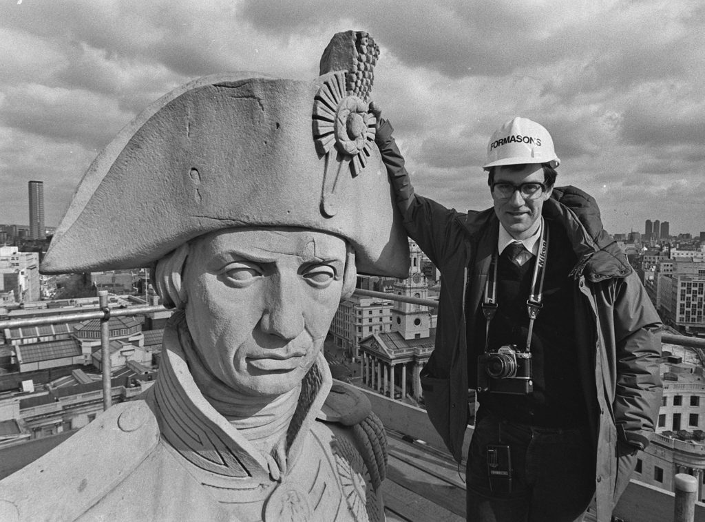 Martin Keene at the top of Nelson’s column in his days as a photographer